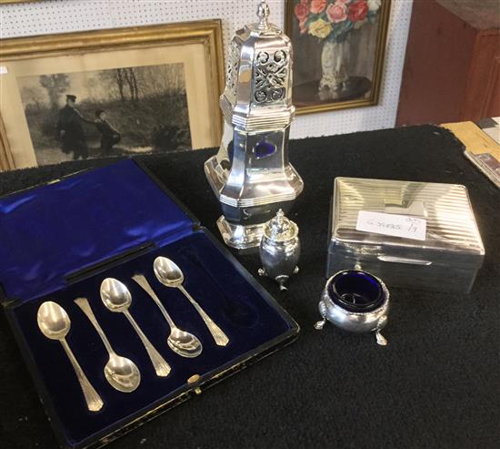 Silver sugar sifter, cig. box, spoons etc.